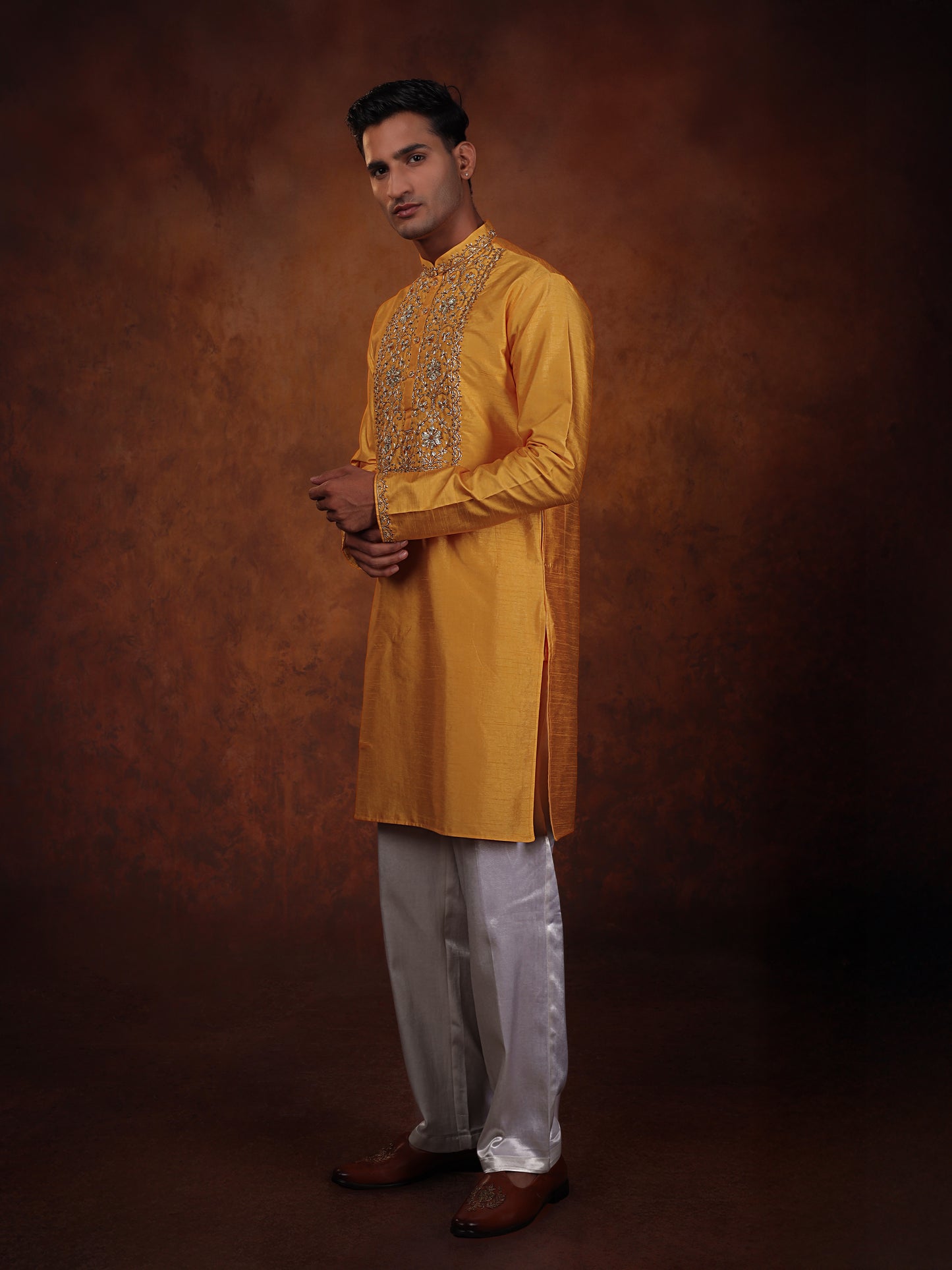 Mustered yellow intricate pitta work with off white straight pant